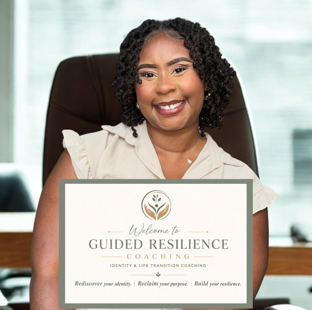 Shonta J. Caruthers seated in her office beside a Welcome to Guided Resilience Coaching sign